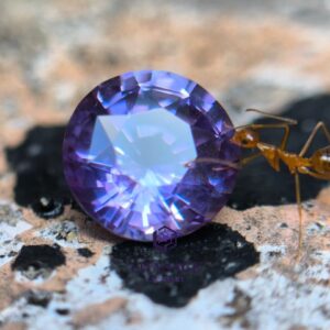 1.25 ct unheated Ceylon purple sapphire round cut with pink violet and bluish hue